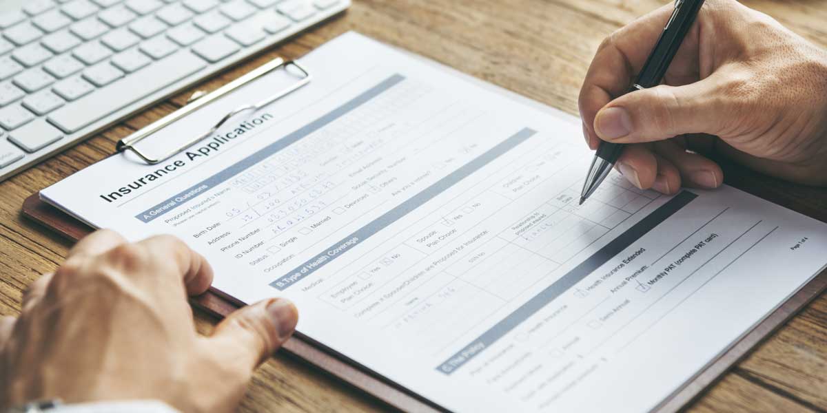 Health insurance enrollment documents for employee benefits planning and small business coverage